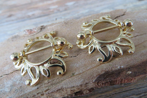 Gold Ion Plated Sun Burst 14G Nipple Shields Pair